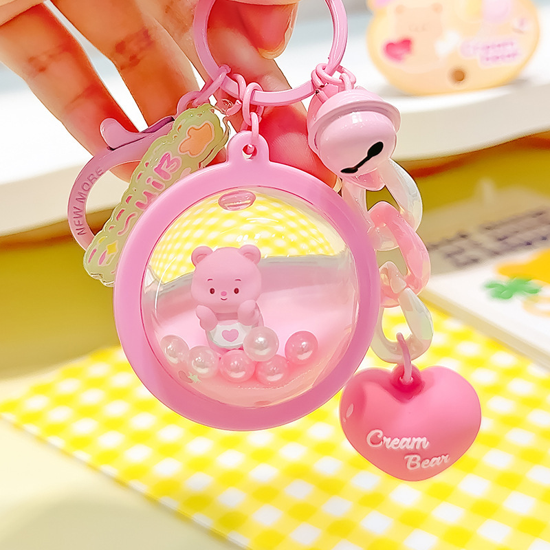 Cute original cartoon butter pixie ball into the oil key button and a small gift.