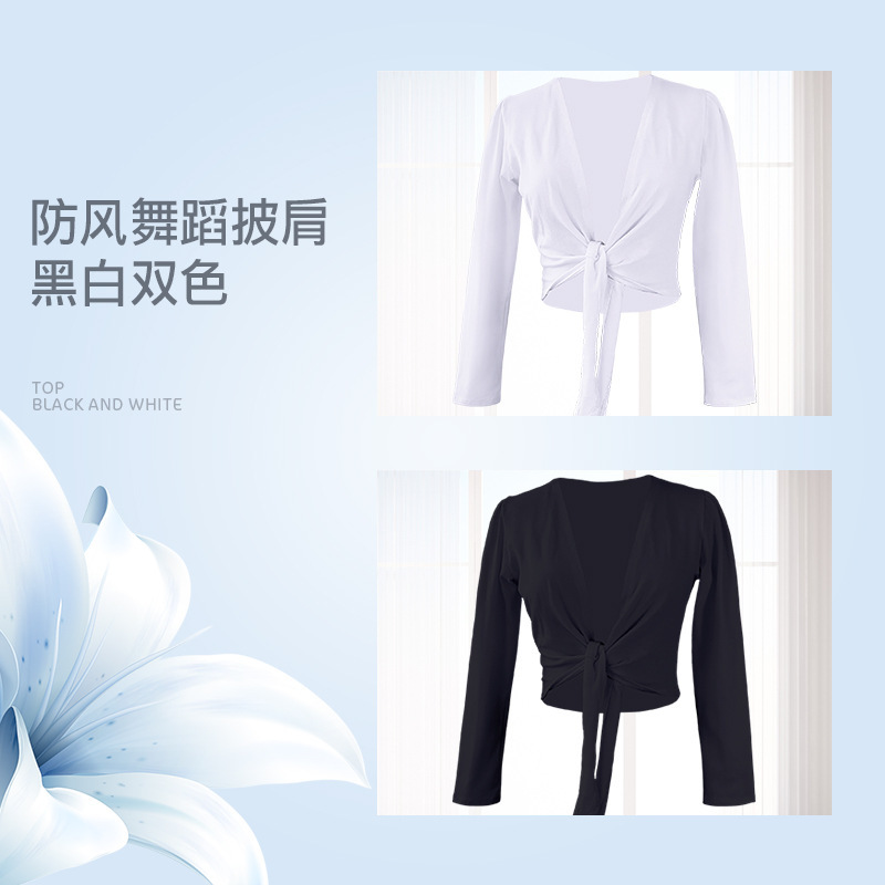 The adult ballet dress and dance coat with a black and white shirt and long sleeves.