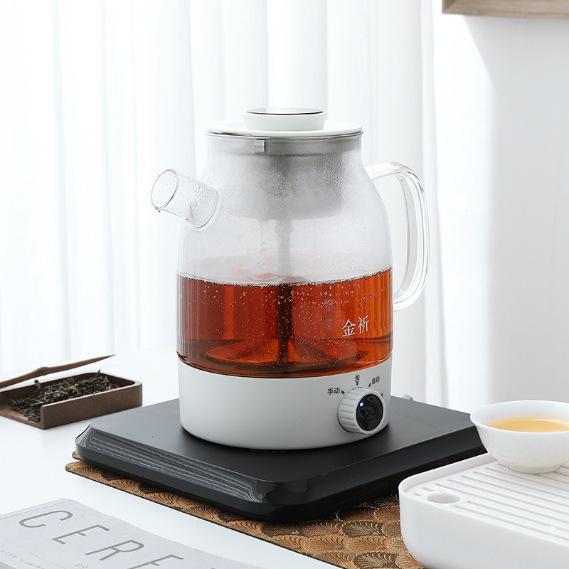 The tea cooker cooks a teapot with a multi-purpose steamer, all automatic.