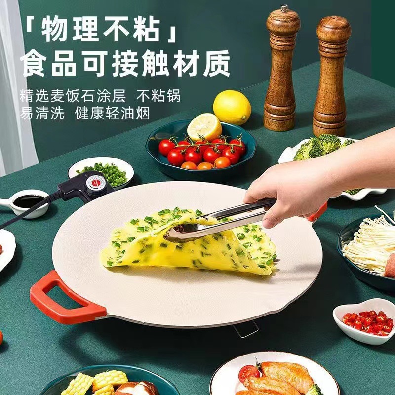 Một máy nướng điện đa mục đích với một cái chảo nướng không khói, không khói, không có nhiều mục đích.