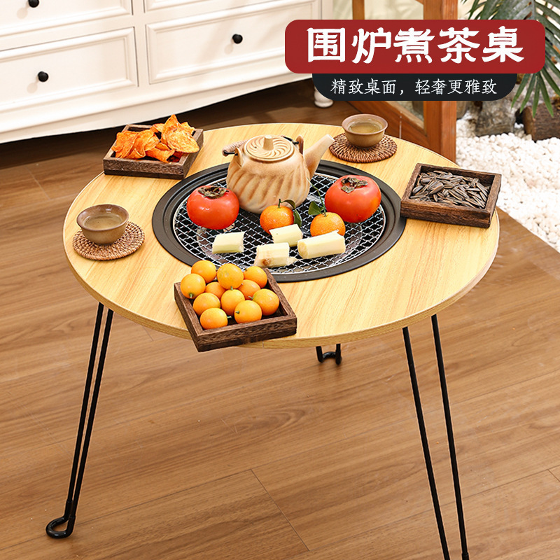 Trong các lò sưởi ngoài trời nơi nấu trà, các lò nướng bàn cắm trại sử dụng lò nướng xếp nhiều mục đích để sưởi ấm.