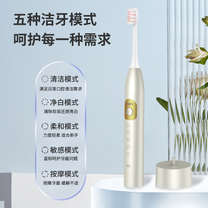 Một khối lượng dài hạn của bàn chải điện người lớn bị treo lơ lửng.