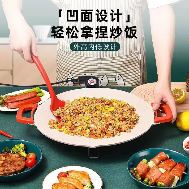 Một máy nướng điện đa mục đích với một cái chảo nướng không khói, không khói, không có nhiều mục đích.