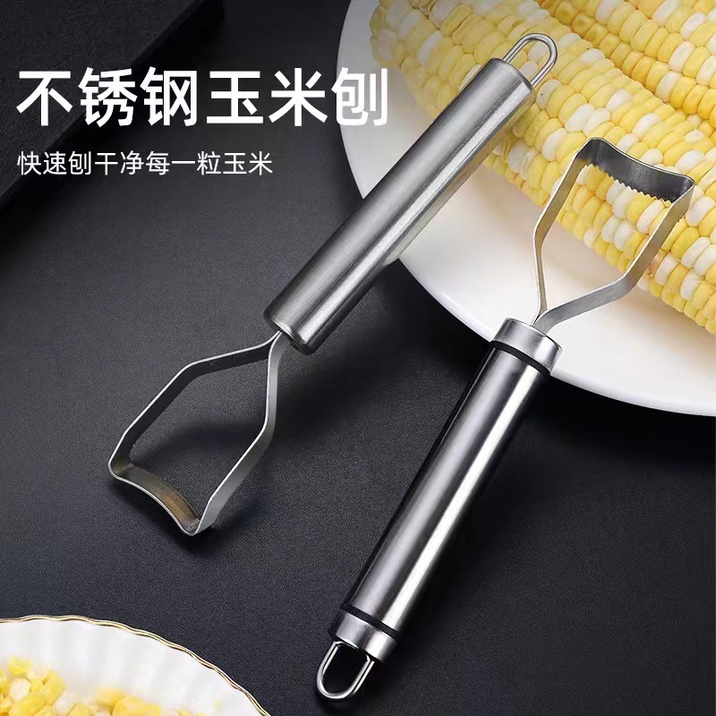 Một ngôi nhà không rỉ thép với một dụng cụ bếp nhỏ, một bộ phận tách hạt bắp.