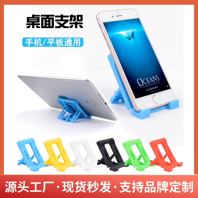 Một cột điện thoại di động trực tiếp cho phép gấp máy điện thoại di động đứng màn hình nền để quay với một bàn di động.