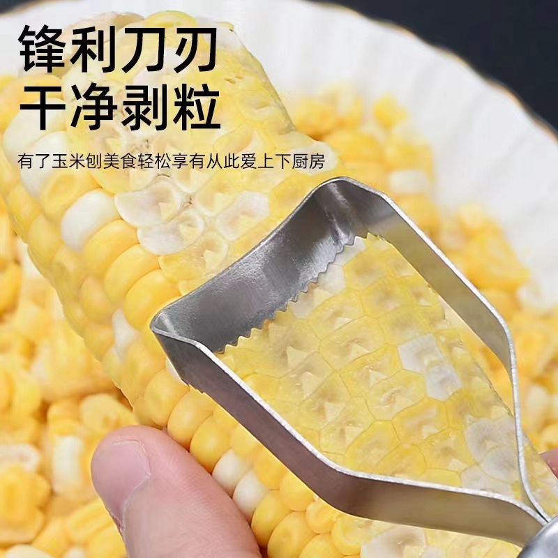 Một ngôi nhà không rỉ thép với một dụng cụ bếp nhỏ, một bộ phận tách hạt bắp.