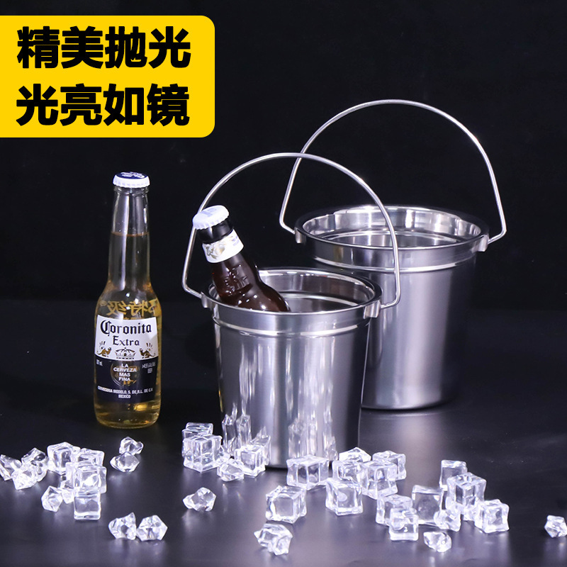 The stainless steel bucket of champagne and beer.