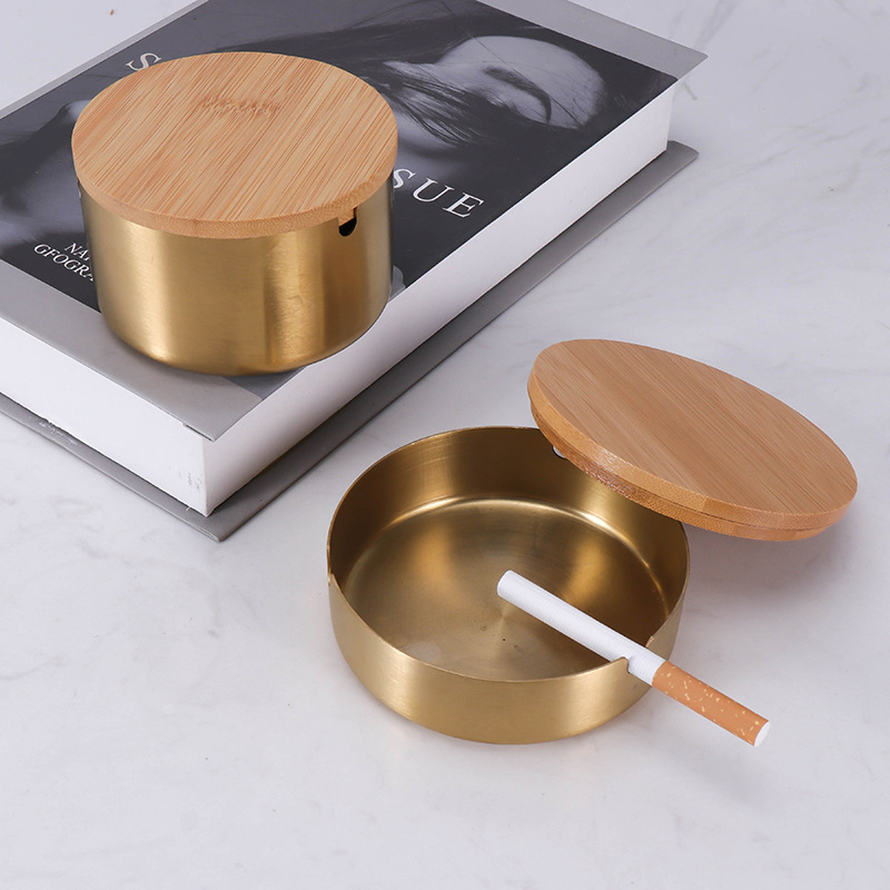 With a stainless steel ashtray bar and an ashtray in the hotel.