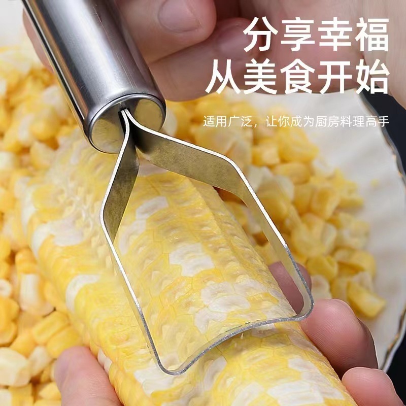 Một ngôi nhà không rỉ thép với một dụng cụ bếp nhỏ, một bộ phận tách hạt bắp.