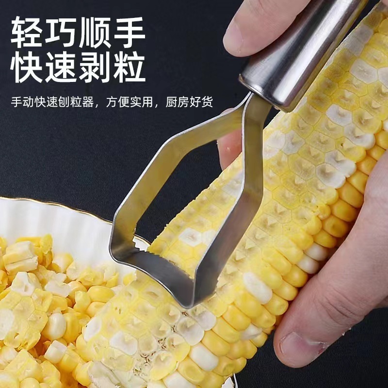 Một ngôi nhà không rỉ thép với một dụng cụ bếp nhỏ, một bộ phận tách hạt bắp.