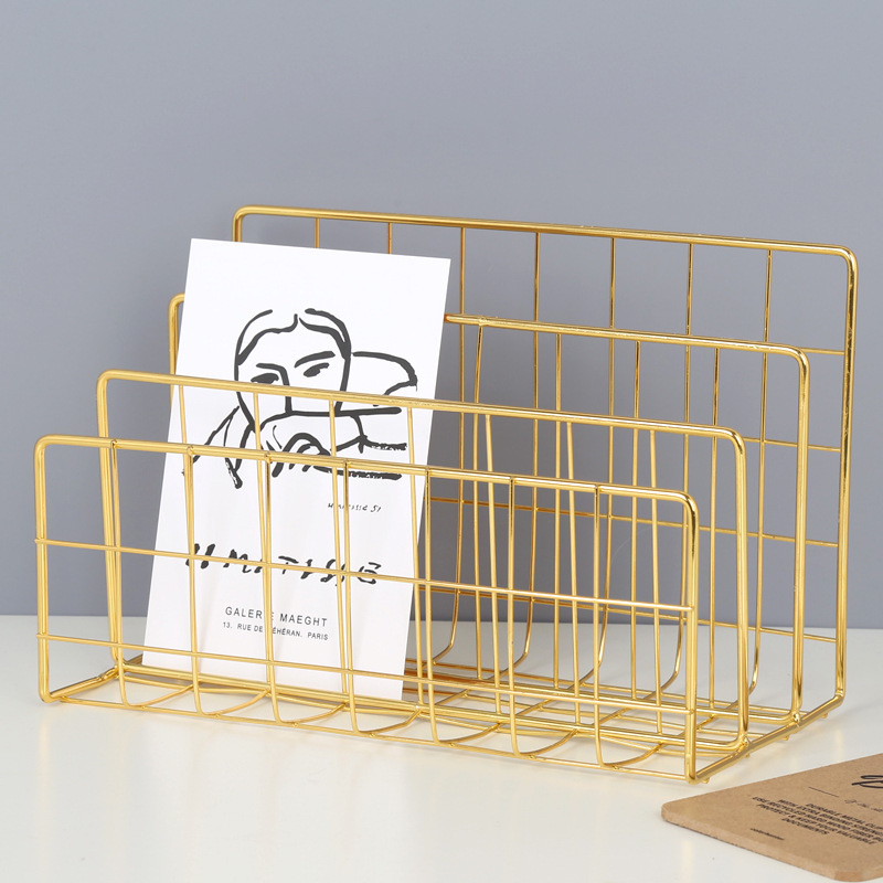 On the table, an iron student's book-stand drawing bookcases for the Nordic Ins windboards.