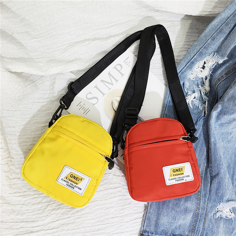 The new 2023 nylon bag is about a small, small-size, small-size, one-shoulder-slashed girl's bag.