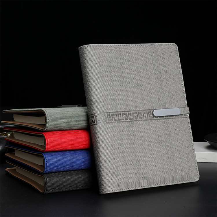 Những cuốn sổ được tùy chỉnh, thủ tục của sự kiện kinh doanh sáng tạo A5, và cuốn sách PU bằng da được đặt thành logo.