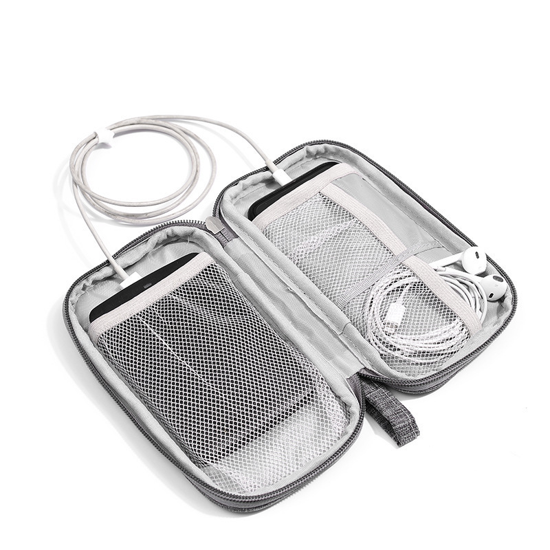 Customize the LOGO multi-purpose earthquake-proof mobile digital spares to receive a bag of cell phone bags charged with the data line