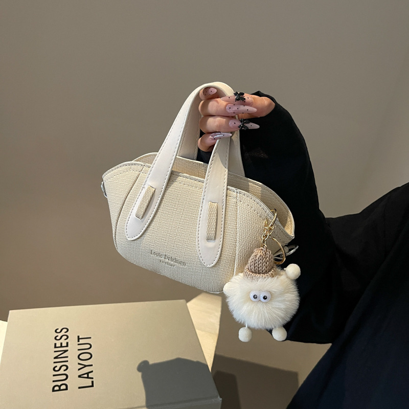 Korea's small-coloured handbag girl, 2024 new fashion handbags, light handbags, one-shoulder slop packs.