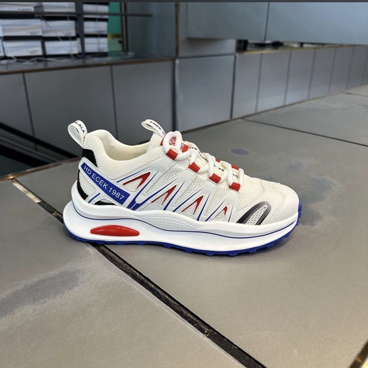 The man with the sneakers has a nice, comfortable, light-tide base.