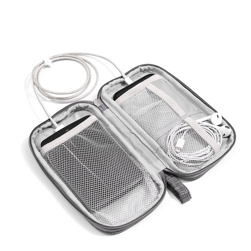 Wholesale multi-purpose anti-shock phone digital spares to receive a bag of cell phone bags to charge the data line to receive a spot