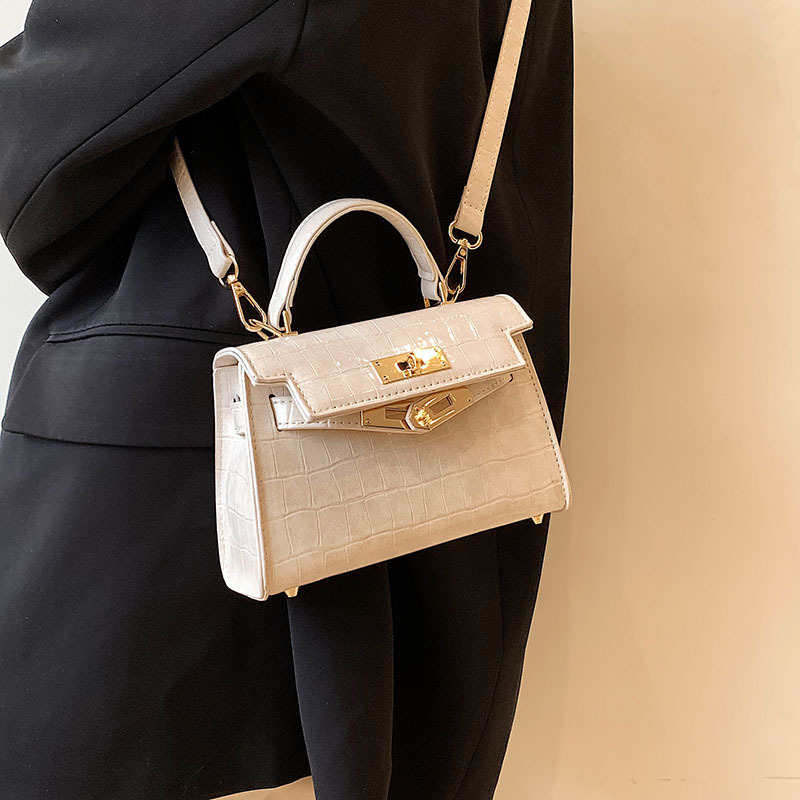 69B720 small bag girl, 2022 new twirling bag, stone-striped little bag, Kelly bag.