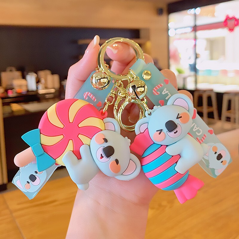 Kẹo koola dễ thương với một cái nút chìa khóa để hoạt hình và món quà của trẻ em được đặt trong một túi 7x4.