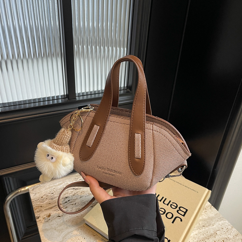 Korea's small-coloured handbag girl, 2024 new fashion handbags, light handbags, one-shoulder slop packs.