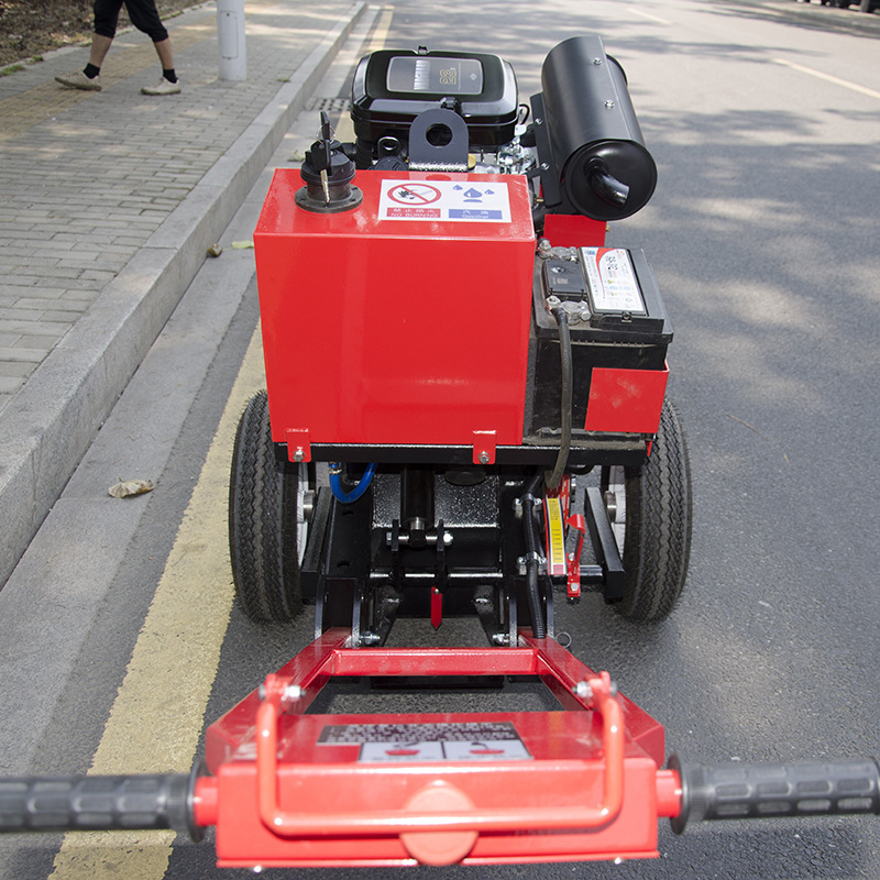 K25, hand-push road repairer, asphalt concrete surface.