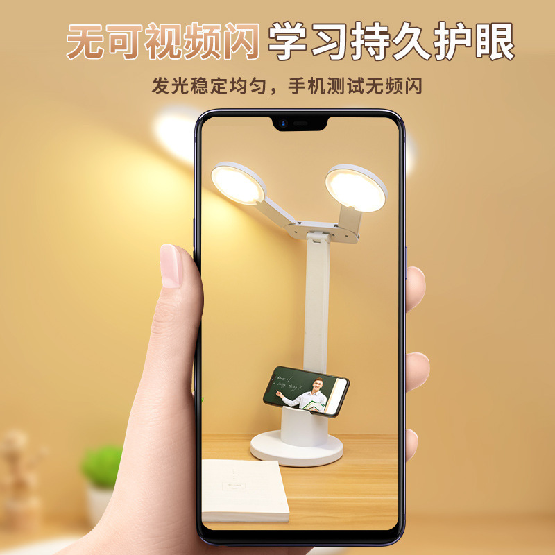 Làm việc cấp cao học gấp đèn LED cho sinh viên chạm vào mắt để nạp điện trong phòng ngủ đọc sách