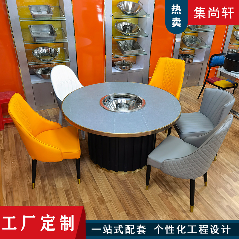 A Korean-style smoke-free magnetizer table with a round-table table marble table and chair at the Commercial Catering Hotpot Hotel.