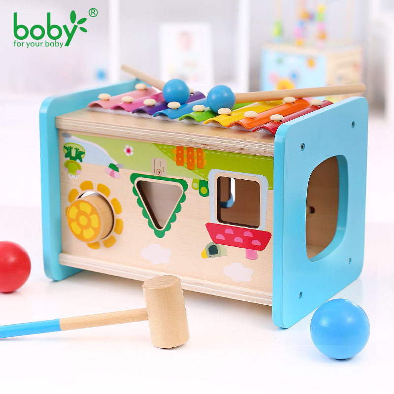 Bobby's eight-tongued ballboard geometry paired up with a four-and-a-one smart box of children's puzzle toys.