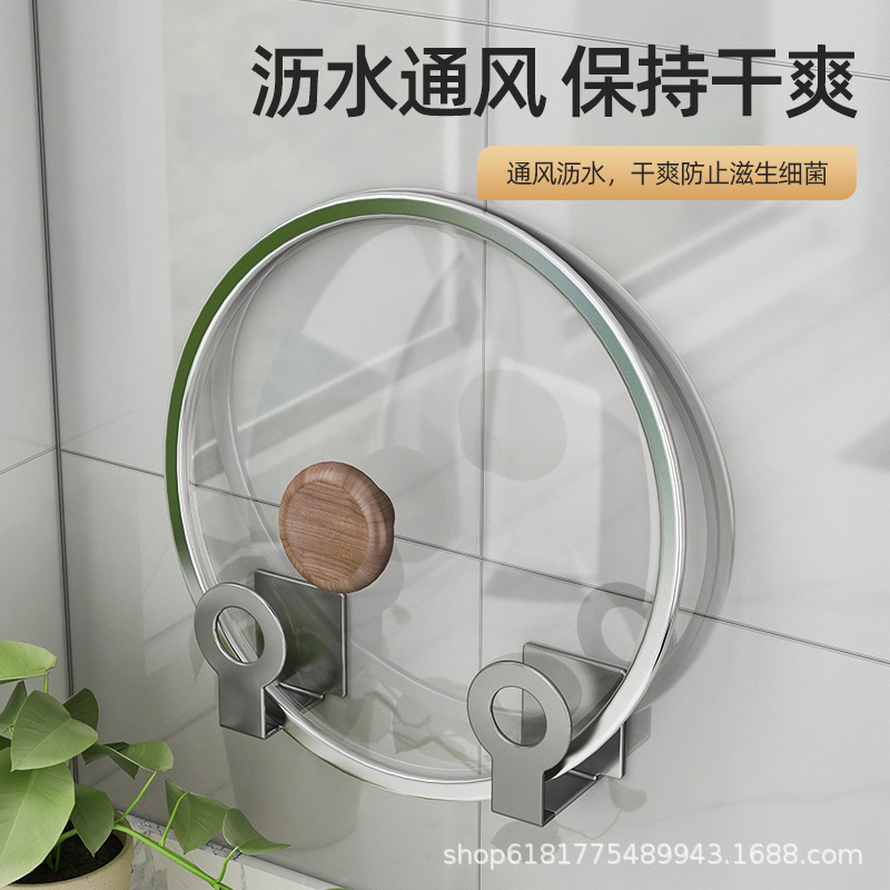 Một cái nắp ngăn nước với một cái đĩa trong nhà bếp có tường bao quanh, nơi bạn sẽ lấy cái bảng hình trụ.