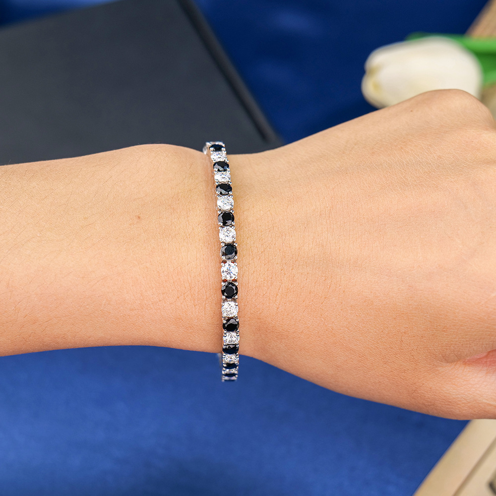 Cross-border heat-selling black boulders, a classic single row of four claws, netball hand-link source.