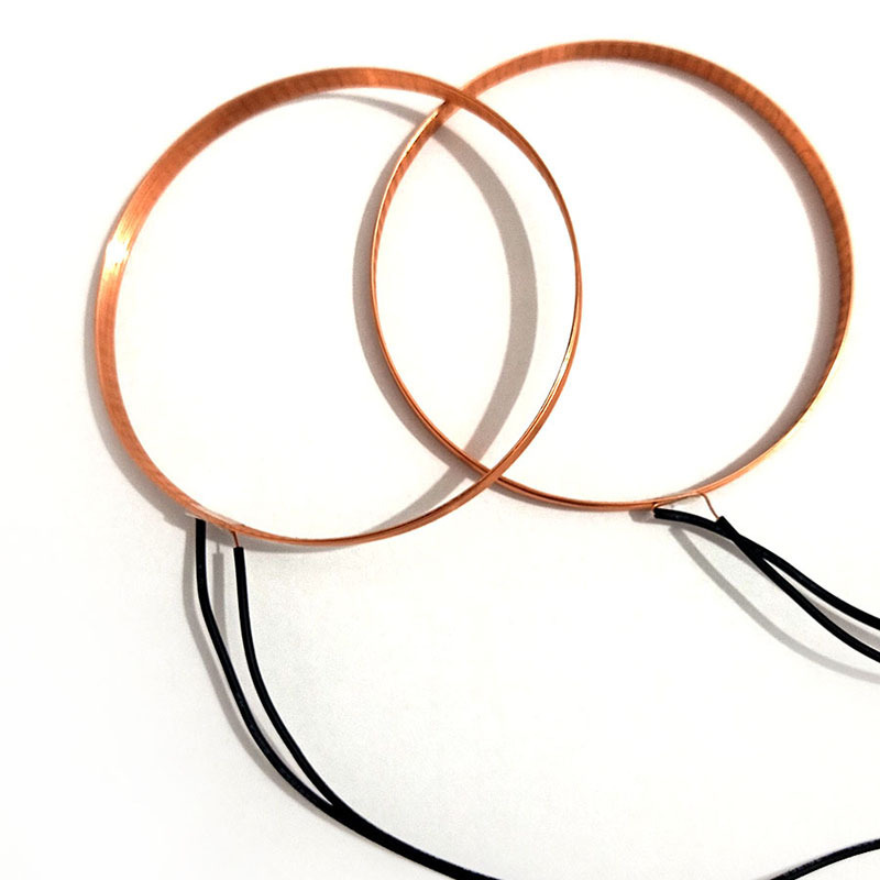 Self-adhesive loop electro-magnetic induction machine hollow coil processing