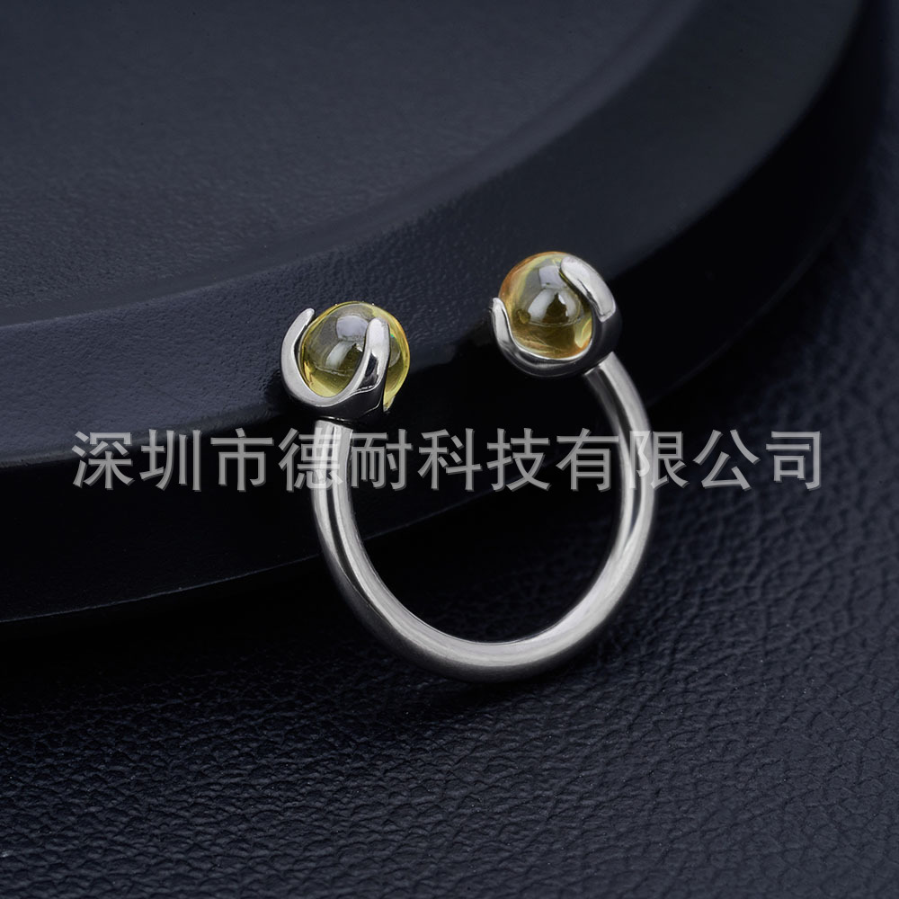 Ms. G23 titanium alloy horse hoof C with a screw of 16G and a crystal nose ring.