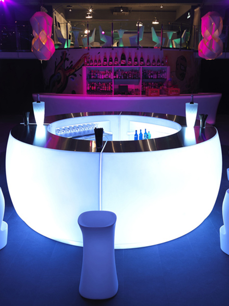 The LED elliptical luminous bar with the furniture creative combination glowing the reception bar table.