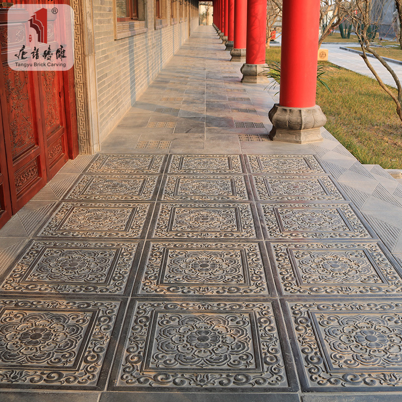 Chinese-language brick sculpturing of an ancient brick wall wall dress.