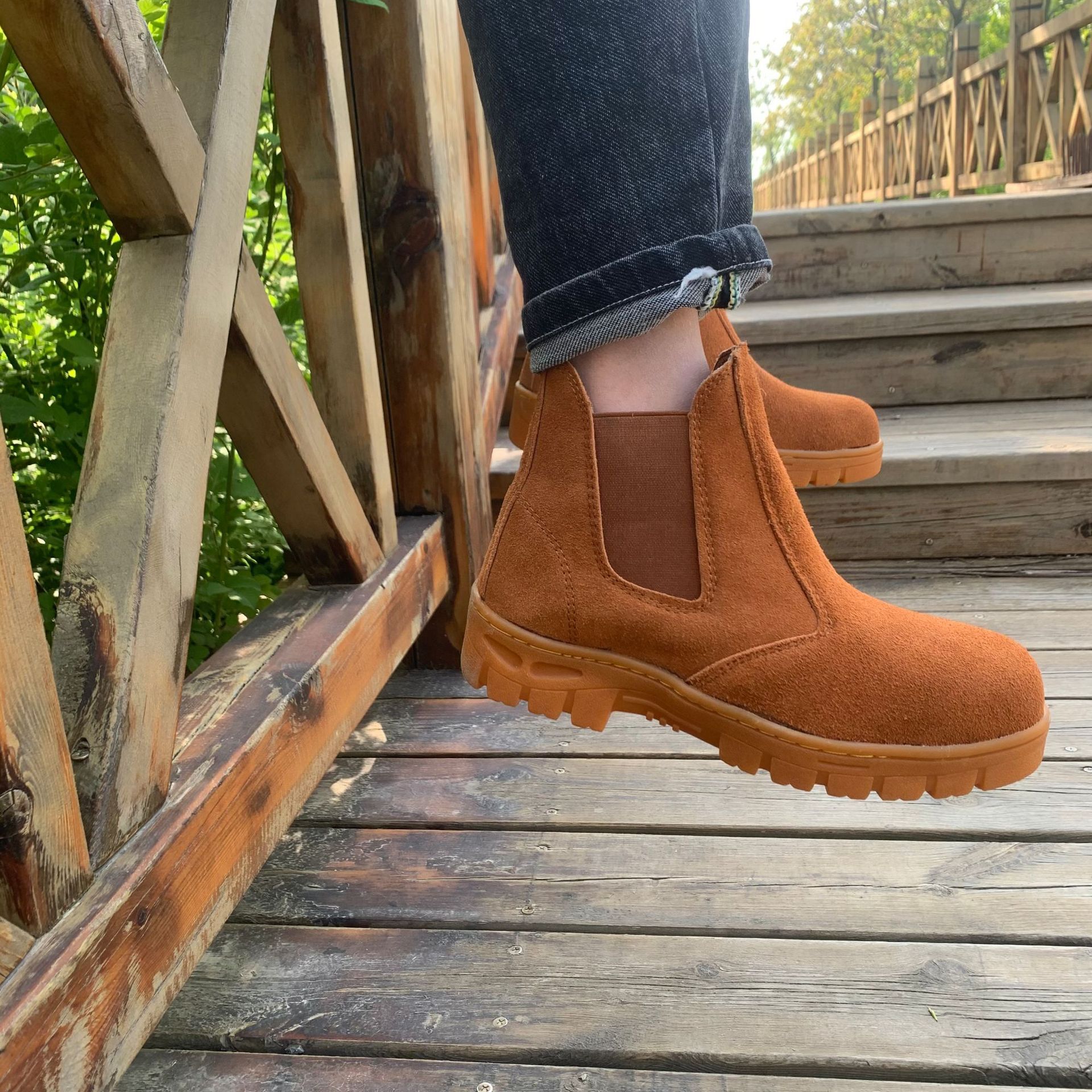 Customizing welders' shoes to protect them from stabbing.