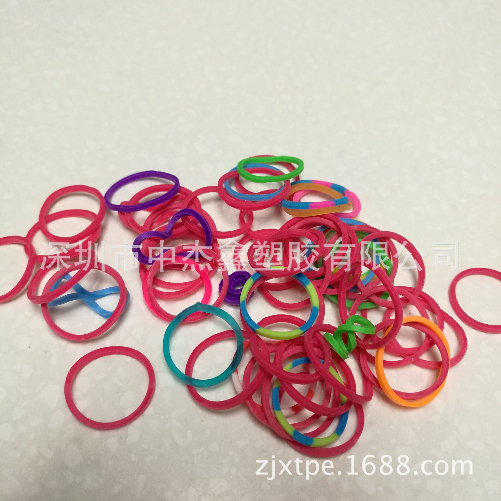 Wholesale and retail, two-colour, high-flex cartoon rubber band TPE particles.