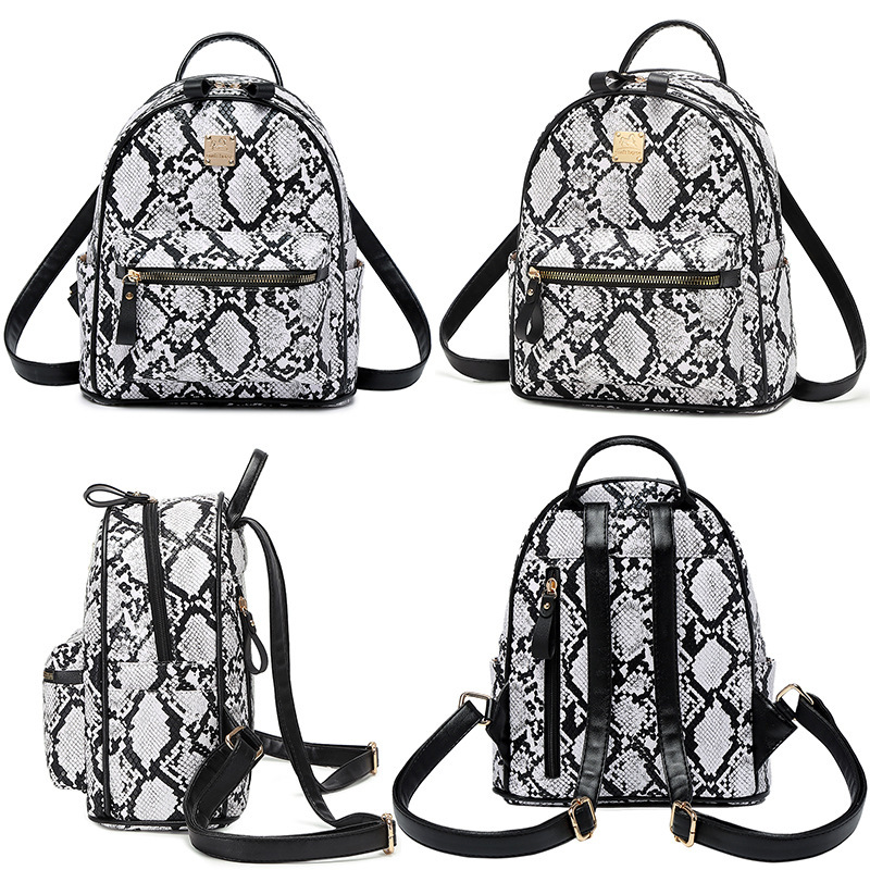 The factory's distribution of the new double-shoulder bag for a fashion-based girl with a small backpack for a large student bag.