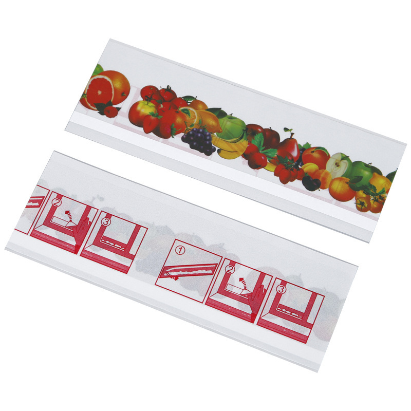 A sticky window with a transparent fruit window and a fly with a fly-paper window.