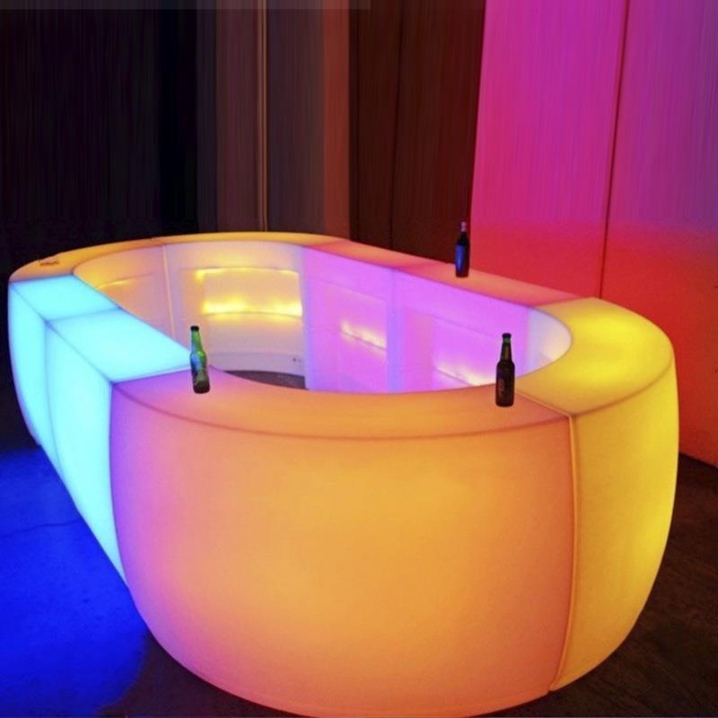 The LED elliptical luminous bar with the furniture creative combination glowing the reception bar table.