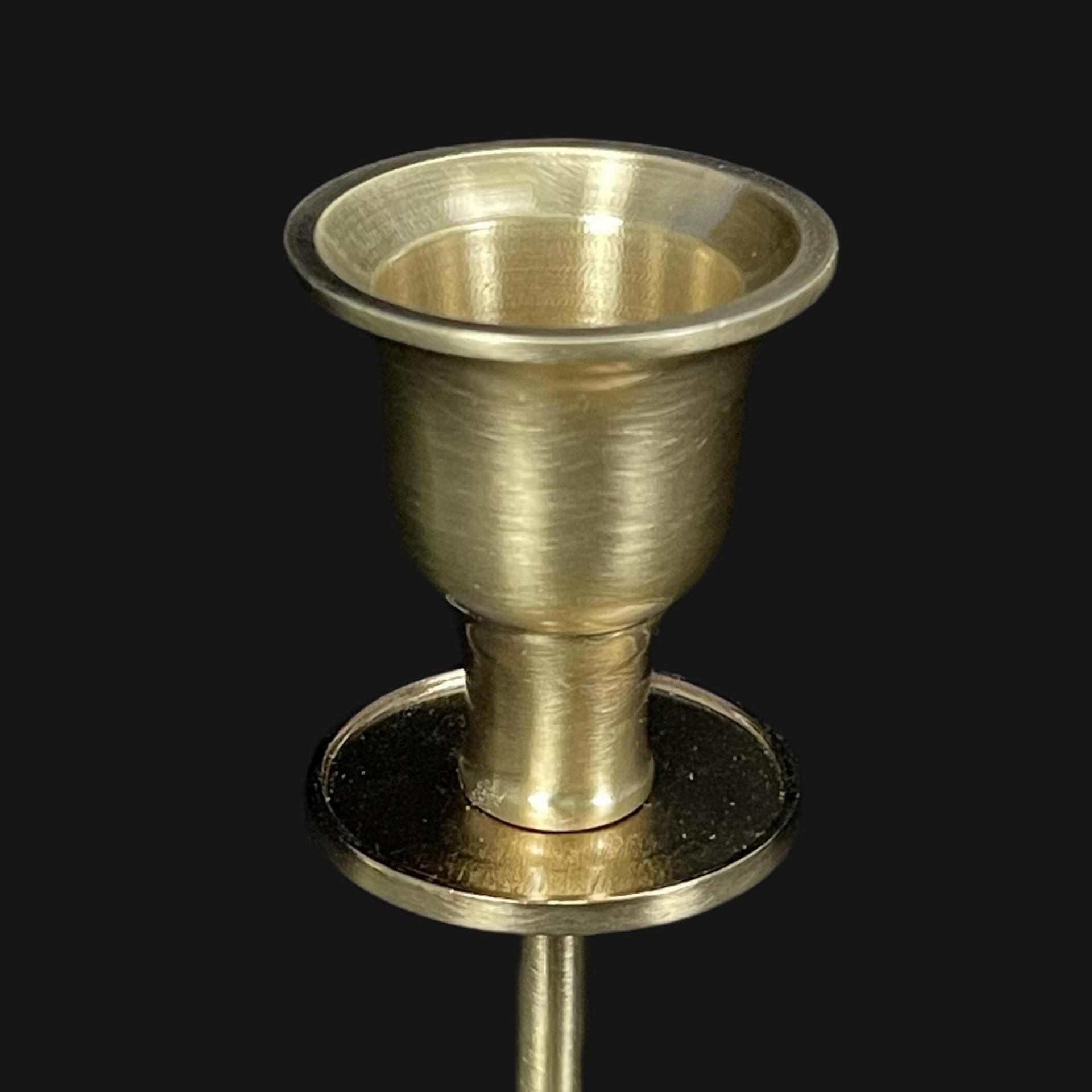 Small batch of zinc alloy plating with a brass portrait of a candlestick.