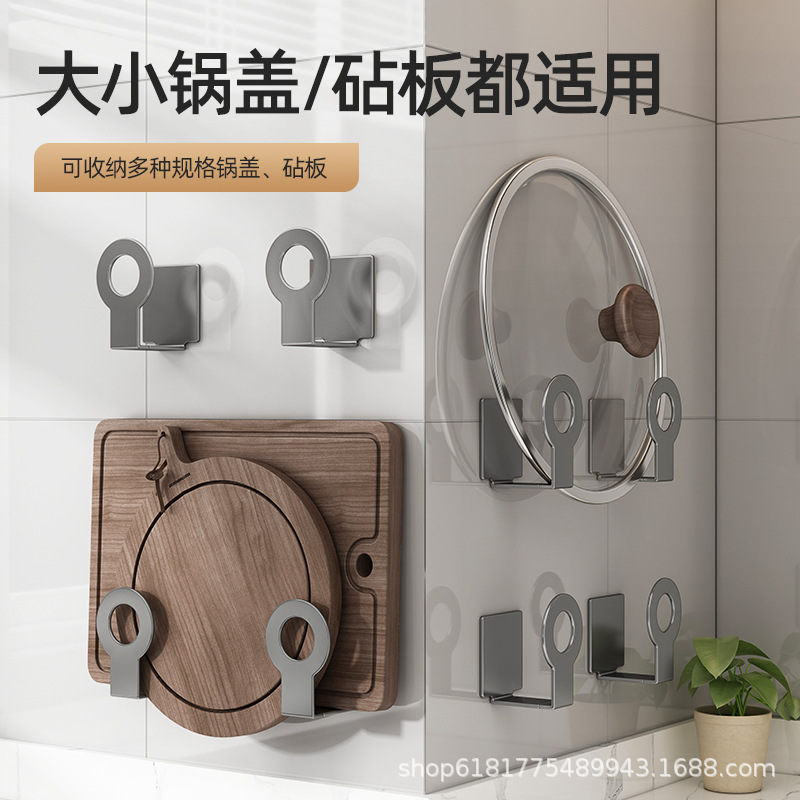 Một cái nắp ngăn nước với một cái đĩa trong nhà bếp có tường bao quanh, nơi bạn sẽ lấy cái bảng hình trụ.