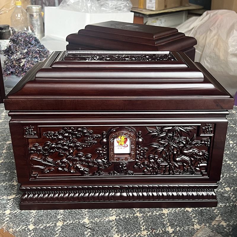 The urn box, the urn, the urn box, the mortuary items.