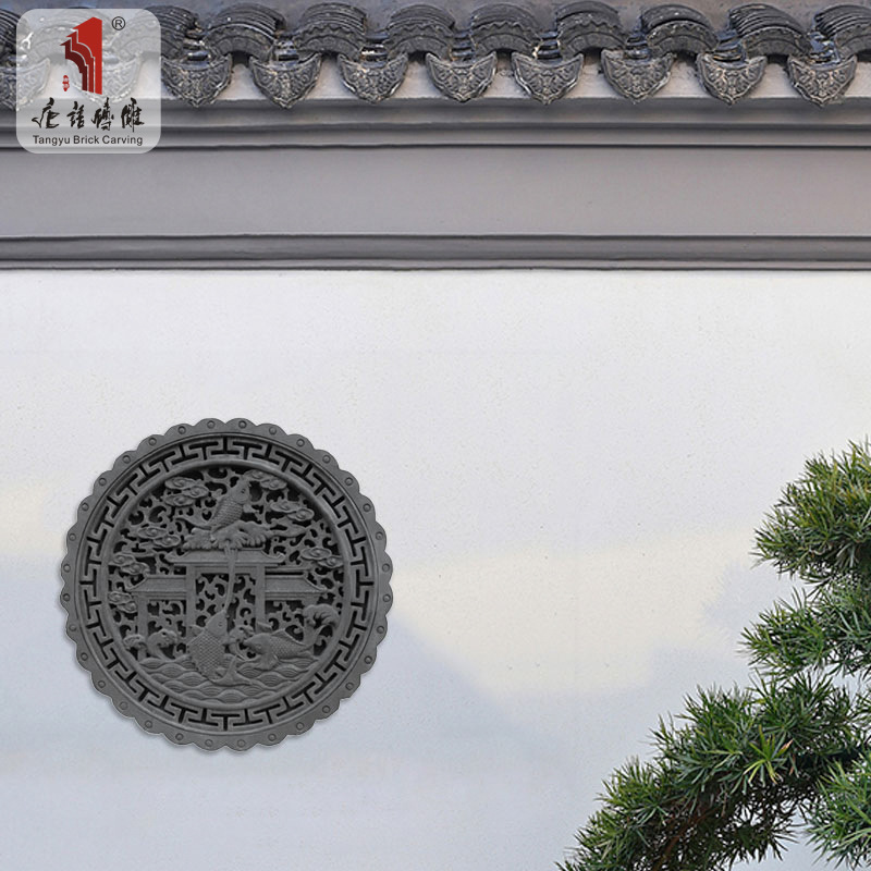 Chinese-language brick sculpturing of the ancient Four-Four courtyard wall in the wall.