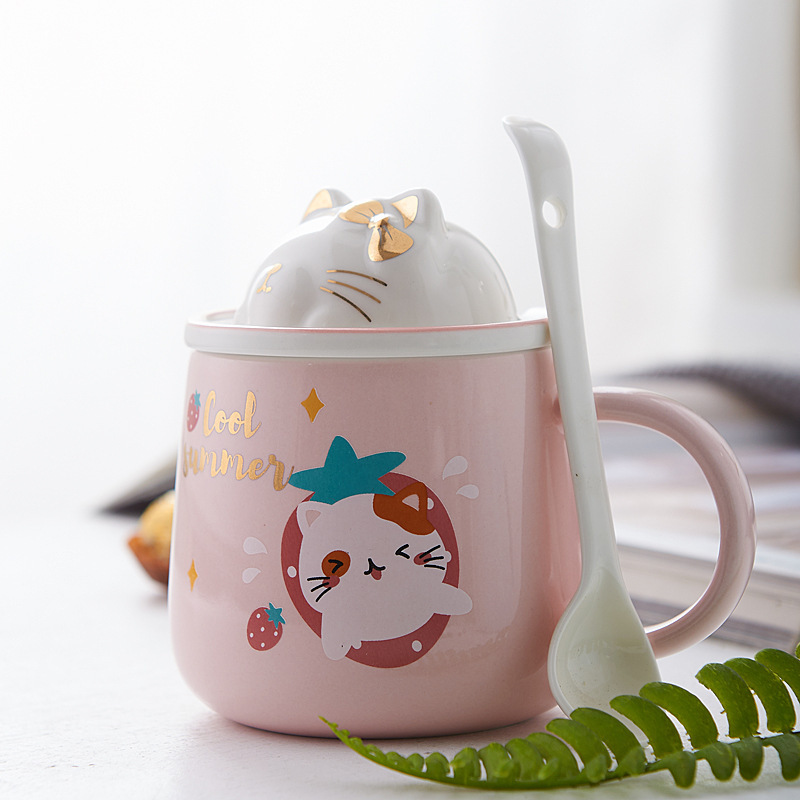 Little new cartoon cat Mark's home with a cute ceramic cup with a spooned office couple's glass.
