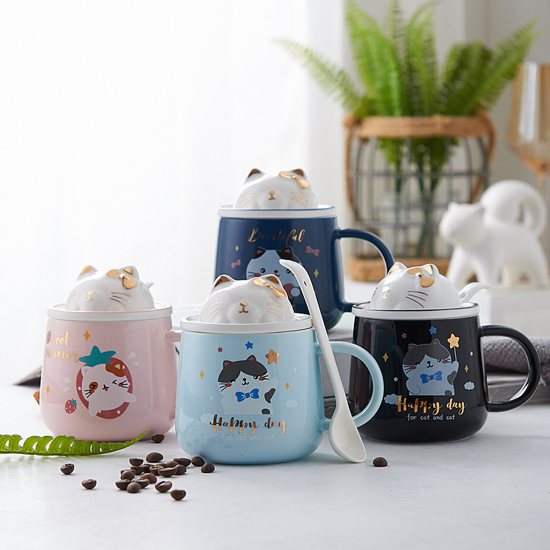 Little new cartoon cat Mark's home with a cute ceramic cup with a spooned office couple's glass.