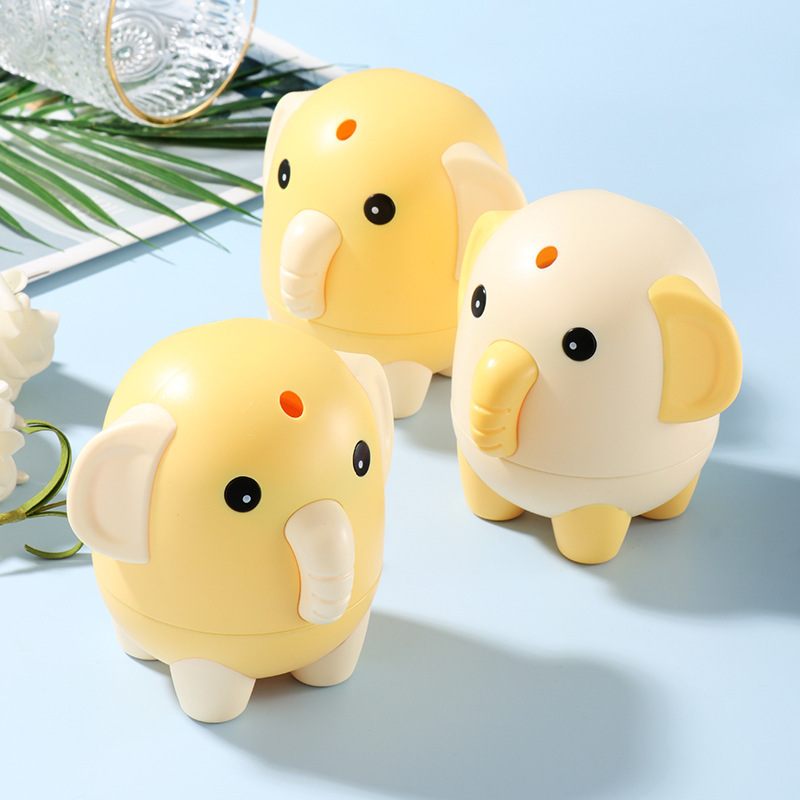 창조적인 치약 상자, 휴대용 만화, 압력이 많은 치약, 노란 코끼리 가정 테이블 세트.