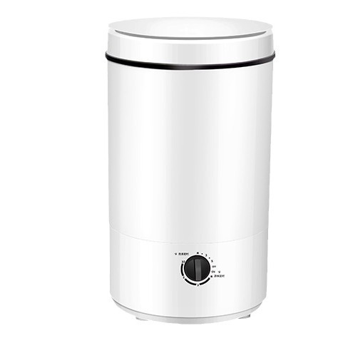 Những tiếng trống nhỏ của một xô đơn bán tự động, máy giặt đơn, nhà với nhựa đường.