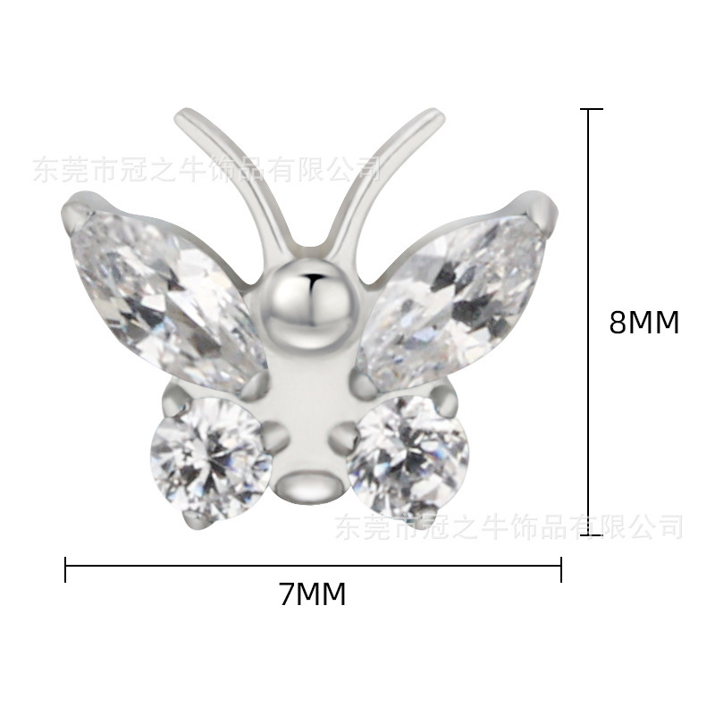 The crowned cow ASTM F-136 titanium alloy, nailed to the inside of the ear, nailed to the body's piercing.