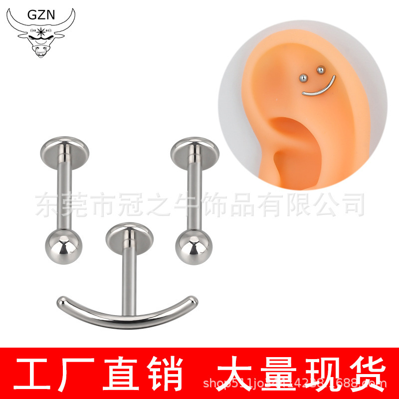 F136/G23 titanium alloys with a smile-faced ear nail in their insides.