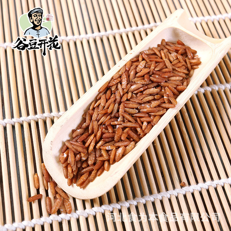 The factory supplies the raw material of millet grains of red rice.